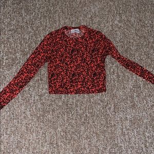 Leopard/orange crop top from Urban Outfitters